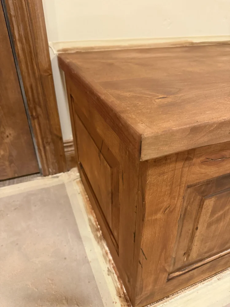Corner detail of custom knotty alder cabinetry and countertop