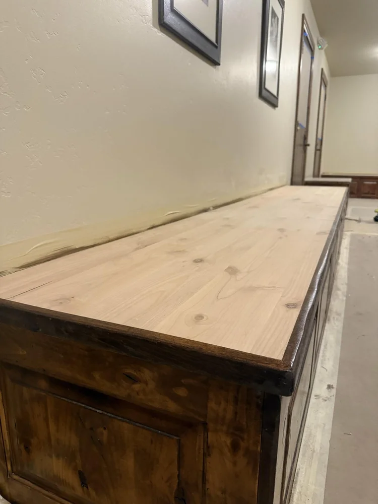 New solid wood top being fitted to a custom built-in bench